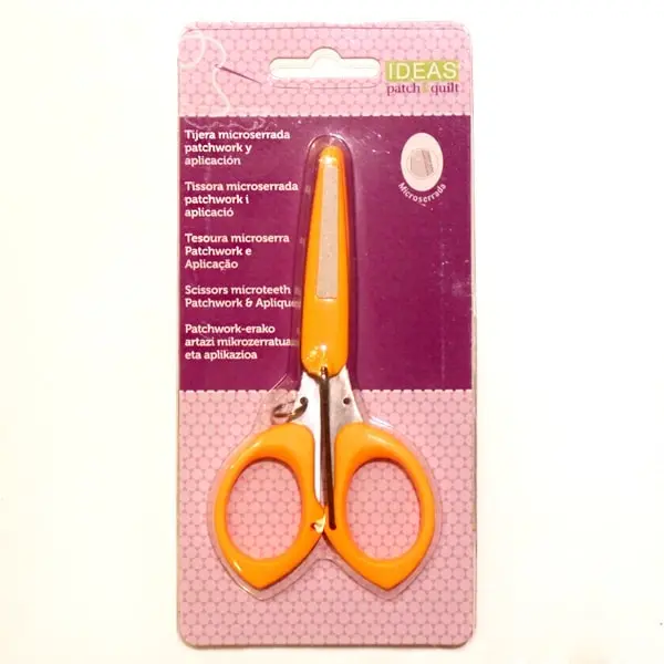 Tijera de filo microserrado