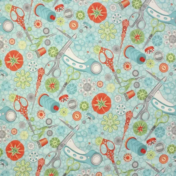 Tela estampada con motivos de costura sobre fondo turquesa