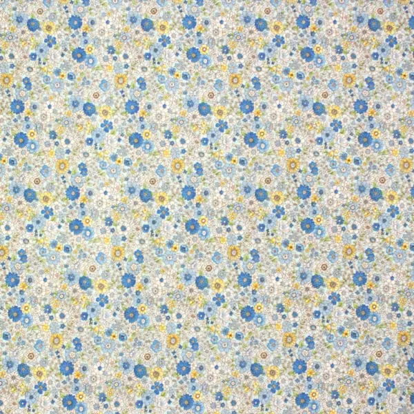 Tela con flores en tonos de diferentes azules y amarillos