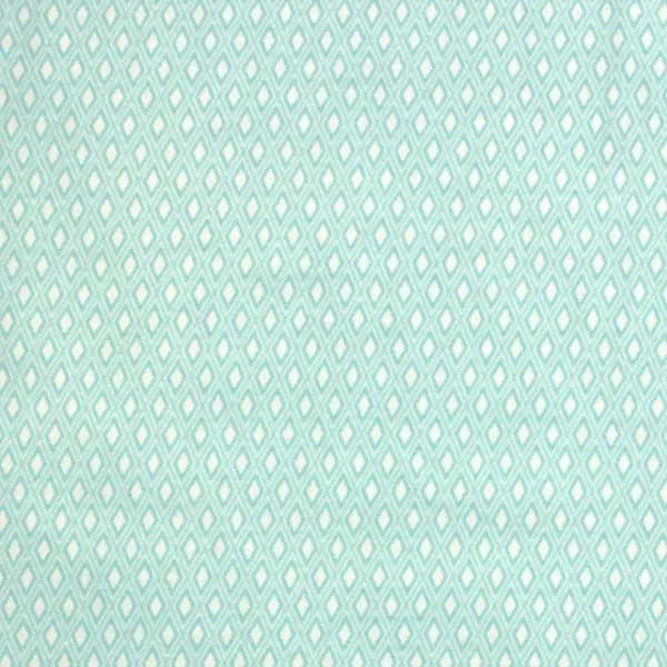 Tela en tonos turquesa con dibujos de rombos en color blanco