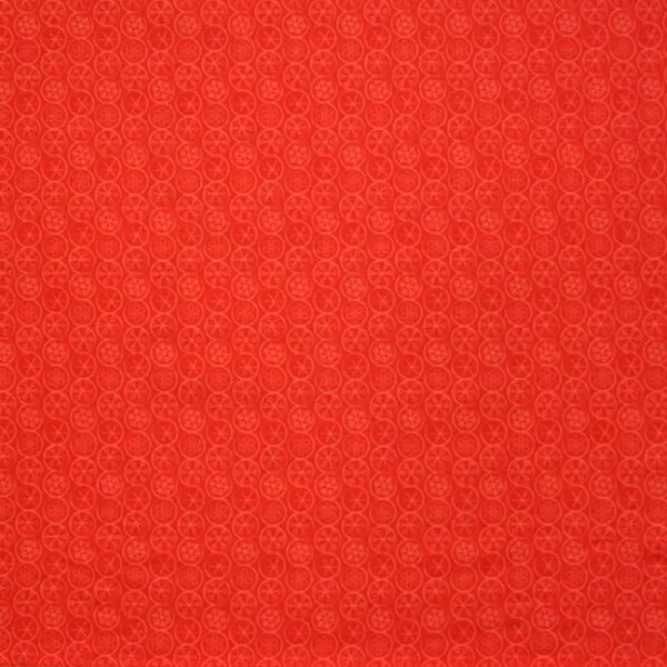 Tela de Navidad fondo rojo con motivos navideños en tonos rojos