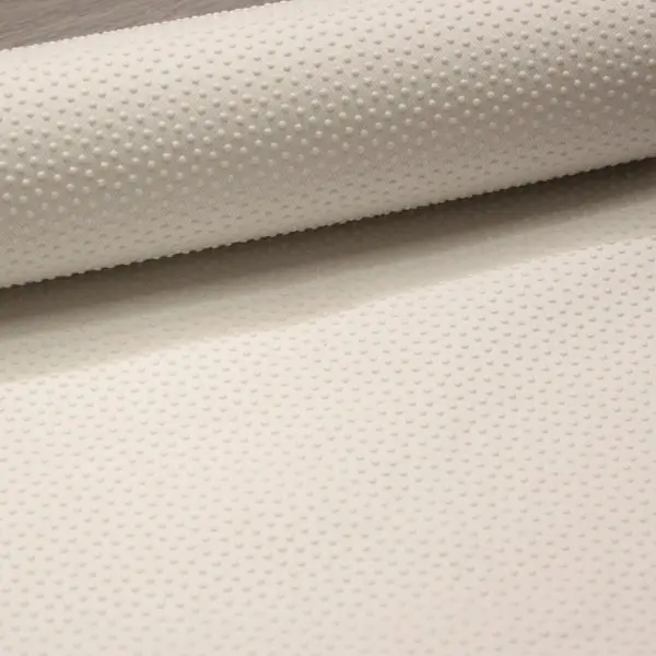 Tejido antideslizante en color blanco. Para calcetines, alfombras, etc