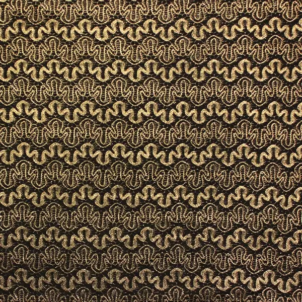 Tejido de blonda color oro viejo