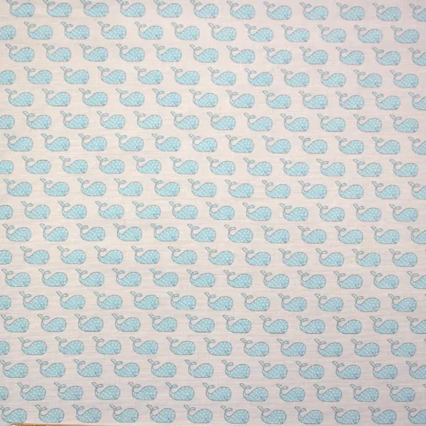 Ballenas Azul, Tela con fondo de rayitas gris y dibujos de ballenas azules con topos blancos