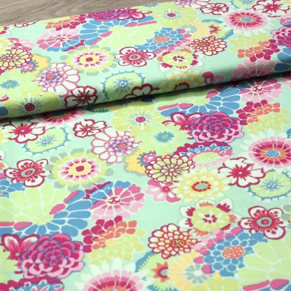 Tejido de algodón patchwork Kaffe Fassett Asian Circles Green de 110cm - Vista del lomo enrollado