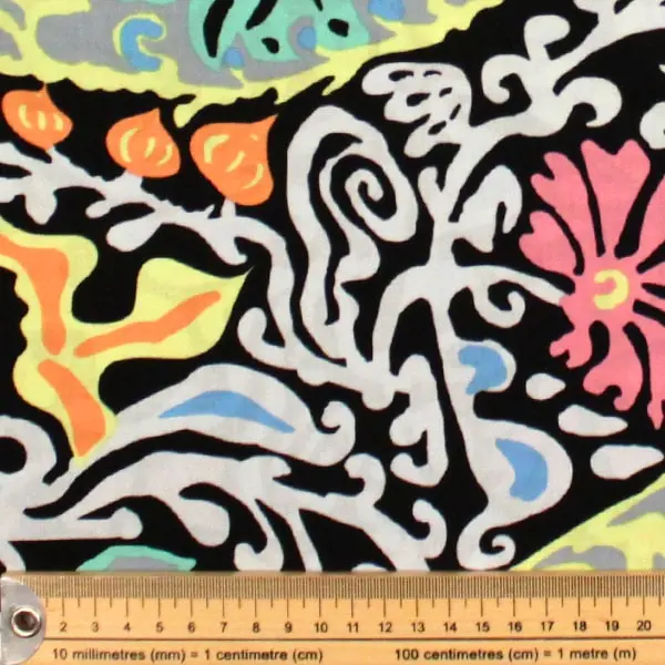 Tela de algodón Kaffe Fassett Bali Contrast con flores y hojas de 110cm - Detalle de la textura y escala de medida