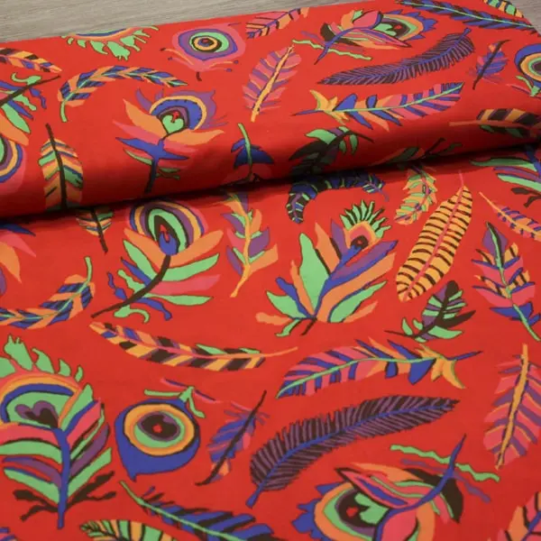 Estampado de pájaros tela algodón patchwork Kaffe Fassett Tickle Red 110cm - Vista del lomo enrollado