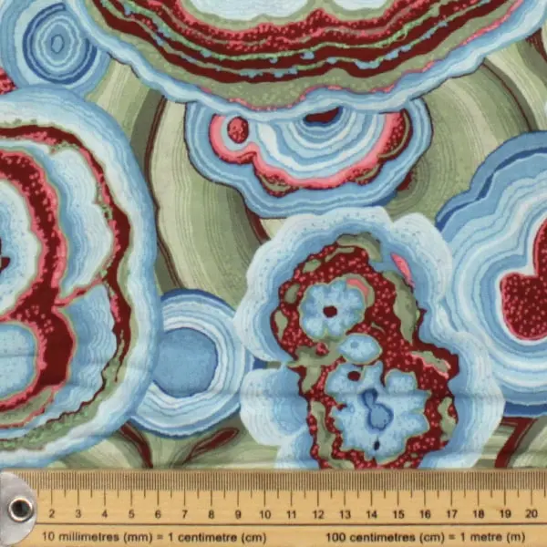Algodón patchwork Kaffe Fassett Agate Turquoise con círculos y flores de 110cm - Detalle de la textura y escala de medida