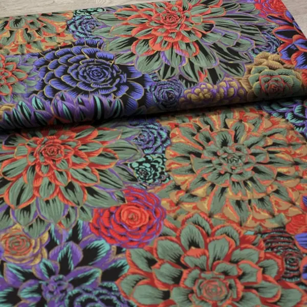 Tela de algodón Kaffe Fassett House Leeks Dark con mandalas morados y fucsia de 110cm - Vista del lomo enrollado