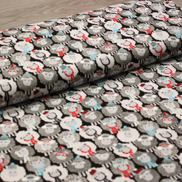 Wooly Friends, Tela con ovejas en tonos blanco y negro con detalles en rojo y turquesa  — vista 3