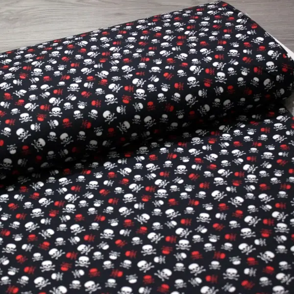 Calaveras, Calaveras en blanco y rojo sobre un fondo negro — vista 3